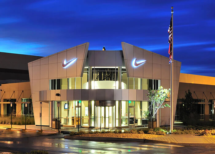Front of Nike Building Exterior With Blue Night Sky
