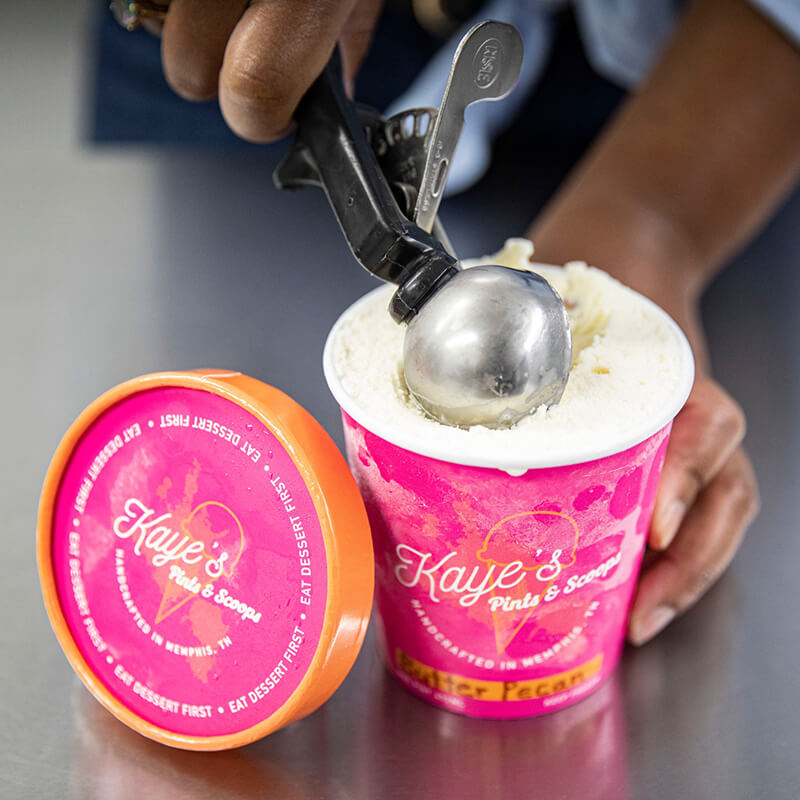 Scooping Ice Cream from a Pint